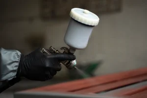 Blog Hand-applied powder coating on metal component — controlled electrostatic process